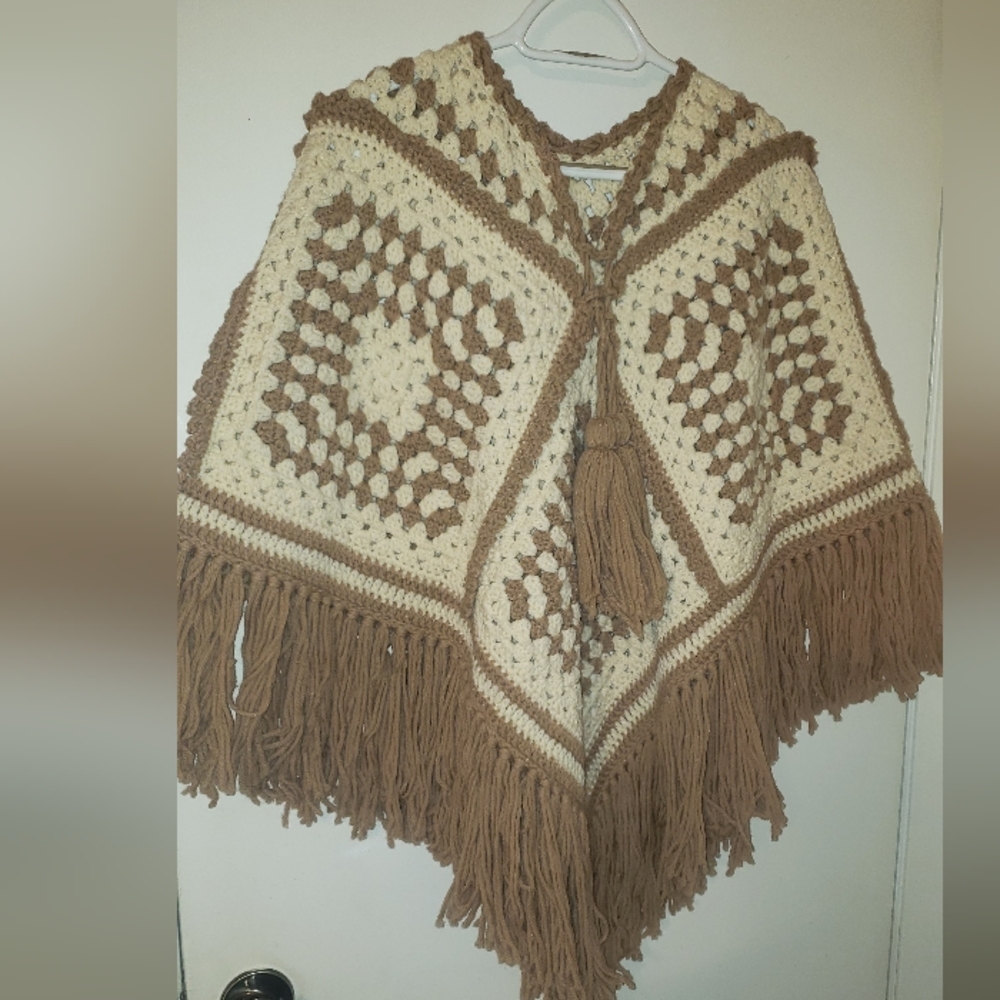 Vintage handmade crochet poncho; beige and tan. One size fits most.